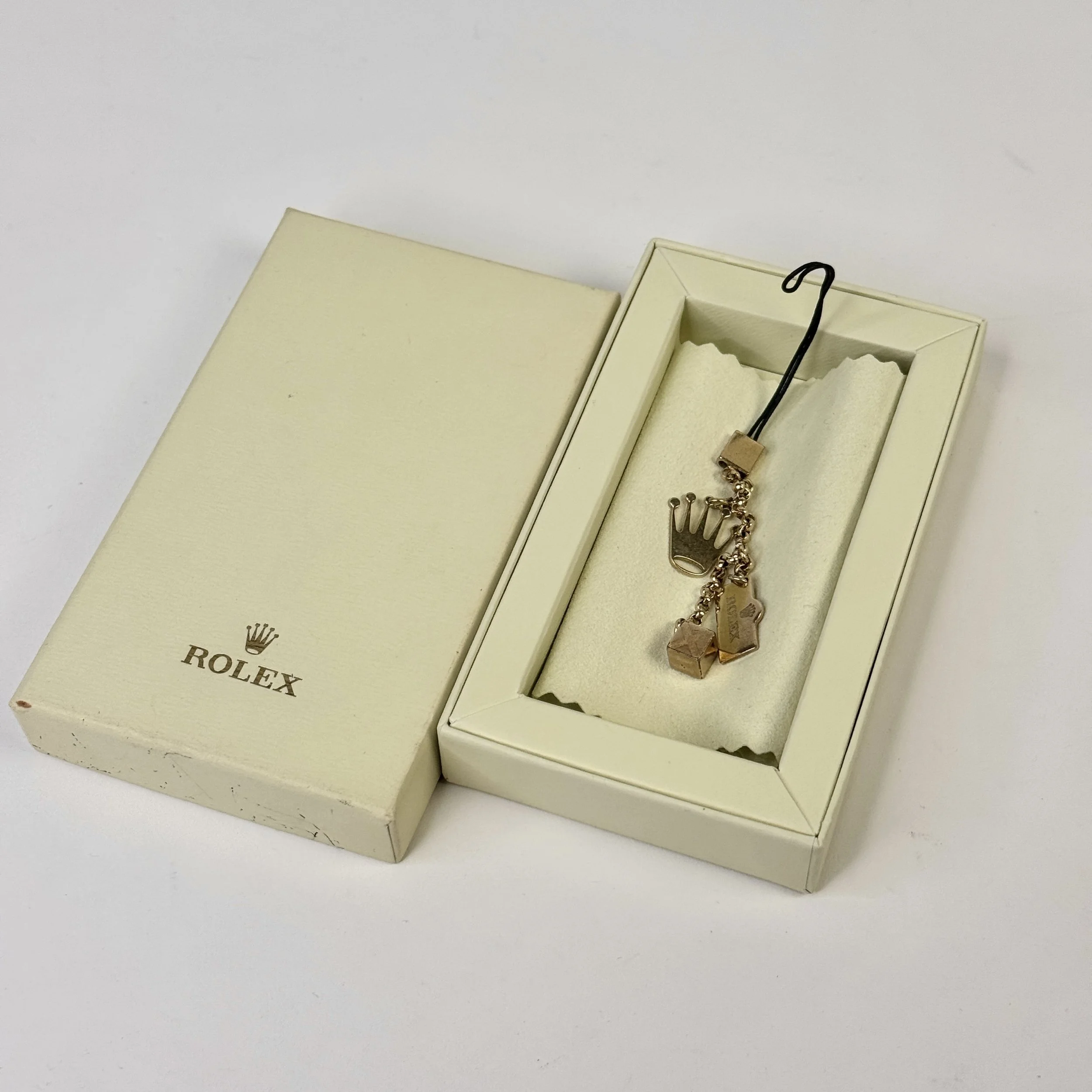 Vintage Rolex Gold Charm Accessory with Box – Collectible Tri-Charm
